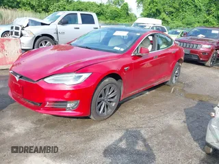 2020 Tesla Model S Long Range with VIN 5YJSA1E25LF396213, listed as a IAAI auction lot 42383231 with 73,125 mi miles and . Bid and sale history available at DreamBid. Image 21.