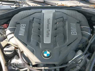 2013 BMW 6 Series 650i z VIN WBAYM9C57DDW20410, wystawiony jako IAAI lot #42348010 z przebiegiem 146 985 mil mil oraz . Historia ofert i sprzedaży dostępna na DreamBid. Obrazek 19.