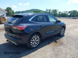 2020 Ford Escape Titanium with VIN 1FMCU9J92LUA27373, listed as a IAAI auction lot 42650077 with 42,179 mi miles and . Bid and sale history available at DreamBid. Image 4.