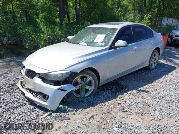 2013 BMW 3 Series 328i xDrive with VIN WBA3B5C53DF593056, listed as a IAAI auction lot 42560965 with 130,644 mi miles and . Bid and sale history available at DreamBid. Image 2.