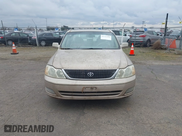 2001 Toyota Avalon XL w/Bucket Seats with VIN 4T1BF28B91U173868, listed as a IAAI auction lot 41721904 with 325,097 mi miles. Bid and sale history available at carsss.com. Image 6.
