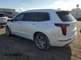 2023 Cadillac XT6 FWD Premium Luxury with VIN 1GYKPCRS5PZ120905, listed as a Copart auction lot 64374254 with 30,694 mi miles and Salvage title. Bid and sale history available at DreamBid. Image 2.