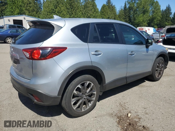2016 Mazda CX-5 Grand Touring with VIN JM3KE4DY2G0764130, listed as a Copart auction lot 55350145 with 85,503 mi miles and Salvage Title. Bid and sale history available at carsss.com. Image 3.