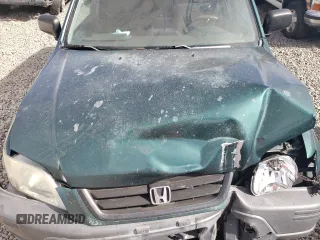 1999 Honda CR-V LX with VIN JHLRD1847XC036630, listed as a Copart auction lot 75708664 with 201,240 mi miles and Salvage Title. Bid and sale history available at carsss.com. Image 11.