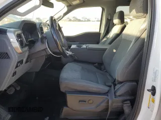 2021 Ford F-150 XL with VIN 1FTEW1CP8MFD11312, listed as a Copart auction lot 88754605 with 142,224 mi miles and Salvage title. Bid and sale history available at DreamBid. Image 7.
