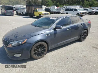 2015 Kia Optima LX z VIN KNAGM4A77F5574643, wystawiony jako Copart lot #58101115 z przebiegiem 107 602 mil mil oraz Czysty tytuł • Clean title. Historia ofert i sprzedaży dostępna na DreamBid. Obrazek 1.