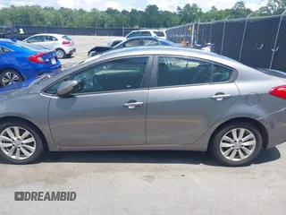 2016 Kia Forte LX z VIN KNAFX4A67G5550953, wystawiony jako IAAI lot #42183097 z przebiegiem 103 512 mil mil oraz . Historia ofert i sprzedaży dostępna na DreamBid. Obrazek 14.
