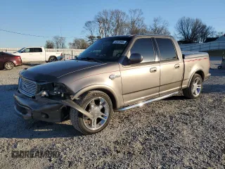 2002 Ford F-150 Harley Davidson with VIN 1FTRW07372KD29243, listed as a Copart auction lot 42972905 with 164,392 mi miles and Salvage Title. Bid and sale history available at carsss.com. Image 1.