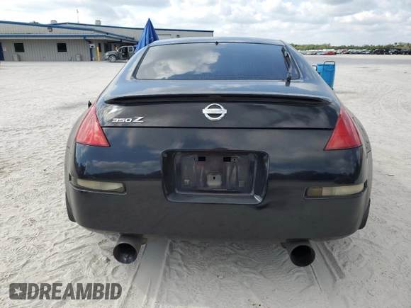 2003 Nissan 350Z Touring z VIN JN1AZ34E63T003086, wystawiony jako Copart lot #54011315 z przebiegiem 222 583 mil mil oraz Szkoda całkowita • Salvage title. Historia ofert i sprzedaży dostępna na DreamBid. Obrazek 6.
