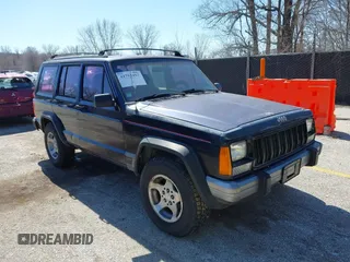 1996 Jeep Cherokee SE z VIN 1J4FJ28S2TL128682, wystawiony jako IAAI lot #41752453 z przebiegiem 270 167 mil mil oraz . Historia ofert i sprzedaży dostępna na DreamBid. Obrazek 1.