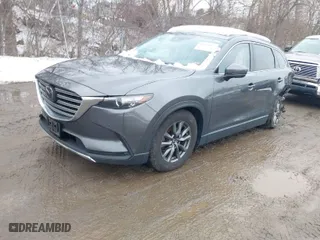 2021 Mazda CX-9 Touring with VIN JM3TCBCY4M0502895, listed as a IAAI auction lot 41476053 with 101,025 mi miles. Bid and sale history available at carsss.com. Image 2.
