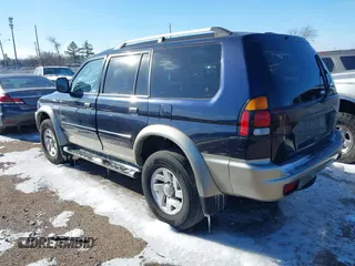 2004 Mitsubishi Montero Sport XLS with VIN JA4MT31R34J008532, listed as a IAAI auction lot 41588402 with 113,546 mi miles. Bid and sale history available at carsss.com. Image 3.