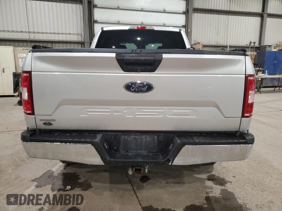 2018 Ford F-150 XL with VIN 1FTFW1E50JFB35013, listed as a Copart auction lot 57240755 with 127,401 mi miles and Salvage title. Bid and sale history available at DreamBid. Image 6.