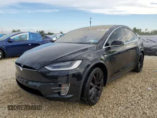 2017 Tesla Model X P90D with VIN 5YJXCAE49HF077650, listed as a Copart auction lot 66477832 with 75,558 mi miles. Bid and sale history available at carsss.com. Image 1.