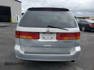 2002 Honda Odyssey EX-L with VIN 2HKRL18902H506828, listed as a Copart auction lot 53735625 with 214,446 mi miles and Salvage title. Bid and sale history available at DreamBid. Image 6.