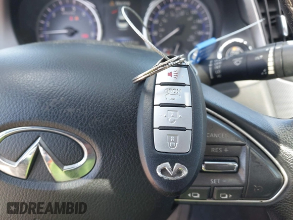 2015 Infiniti Q50 Premium z VIN JN1BV7AP1FM346254, wystawiony jako IAAI lot #42147947 z przebiegiem 147 737 mil mil oraz . Historia ofert i sprzedaży dostępna na DreamBid. Obrazek 11.