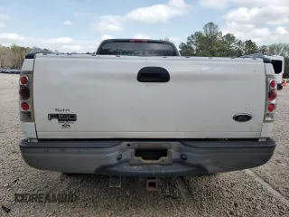 2002 Ford F-150 XL with VIN 1FTRF17262NA10489, listed as a Copart auction lot 50413885 with 203,093 mi miles and Salvage Title. Bid and sale history available at carsss.com. Image 6.