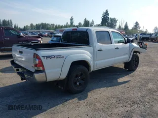 2015 Toyota Tacoma with VIN 3TMLU4EN5FM182720, listed as a IAAI auction lot 42555728 with 183,081 mi miles and . Bid and sale history available at DreamBid. Image 4.