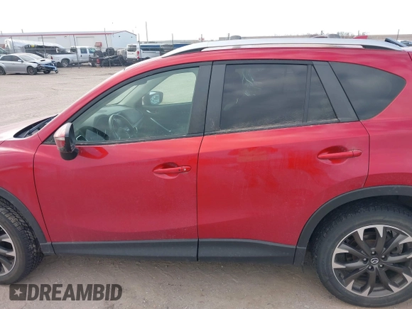 2016 Mazda CX-5 Grand Touring with VIN JM3KE4DY8G0729446, listed as a IAAI auction lot 41871207 with 89,258 mi miles. Bid and sale history available at carsss.com. Image 15.