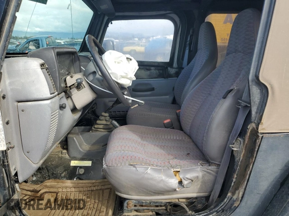 1998 Jeep Wrangler Sport with VIN 1J4FY19S5WP717503, listed as a Copart auction lot 49188195 with 180,717 mi miles and Salvage Title. Bid and sale history available at carsss.com. Image 7.