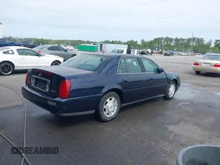 2003 Cadillac DeVille with VIN 1G6KD54Y53U232586, listed as a IAAI auction lot 42071165 with 174,403 mi miles. Bid and sale history available at carsss.com. Image 4.