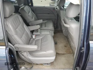 2010 Honda Odyssey EX-L z VIN 5FNRL3H76AB071109, wystawiony jako Copart lot #70342294 z przebiegiem 187 872 mil mil oraz Szkoda całkowita • Salvage title. Historia ofert i sprzedaży dostępna na DreamBid. Obrazek 11.