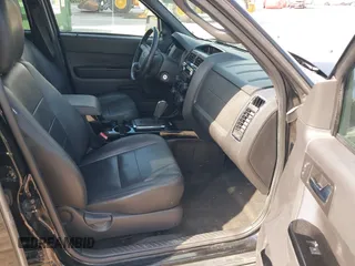 2010 Ford Escape Limited z VIN 1FMCU0EG6AKC04990, wystawiony jako IAAI lot #42206601 z przebiegiem 139 400 mil mil oraz . Historia ofert i sprzedaży dostępna na DreamBid. Obrazek 5.