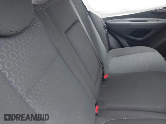 2020 Chevrolet Trax LS with VIN KL7CJKSB3LB049512, listed as a IAAI auction lot 41498513 with 56,649 mi miles and . Bid and sale history available at DreamBid. Image 8.
