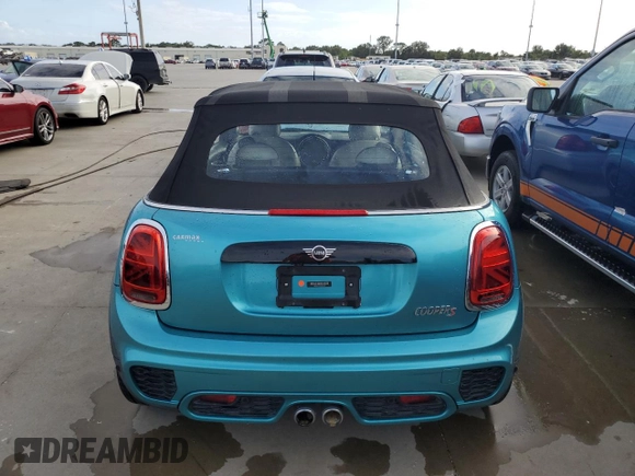 2019 MINI Convertible Cooper S с VIN WMWWG9C59K3E41385, выставлен на аукционе Copart как лот 74269624 с пробегом Не указан миль и На запчасти • Non repairable. История ставок и продаж доступна на DreamBid. Изображение 6.