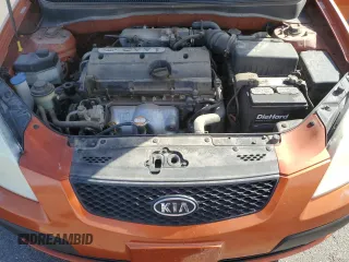 2009 Kia Rio SX with VIN KNADE223496514284, listed as a Copart auction lot 48550105 with 114,411 mi miles and Salvage Title. Bid and sale history available at carsss.com. Image 12.