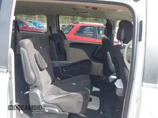 2012 Dodge Grand Caravan SXT with VIN 2C4RDGCGXCR248859, listed as a IAAI auction lot 41829411 with 111,515 mi miles and . Bid and sale history available at DreamBid. Image 8.