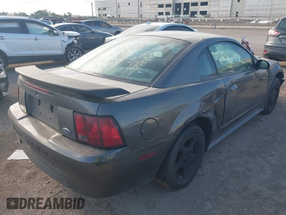 2003 Ford Mustang Standard z VIN 1FAFP40463F341216, wystawiony jako IAAI lot #42601357 z przebiegiem 145 520 mil mil oraz . Historia ofert i sprzedaży dostępna na DreamBid. Obrazek 4.