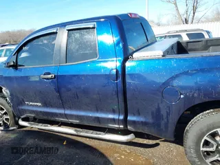 2013 Toyota Tundra z VIN 5TFUM5F14DX043076, wystawiony jako IAAI lot #41633905 z przebiegiem 157 850 mil mil oraz . Historia ofert i sprzedaży dostępna na DreamBid. Obrazek 14.