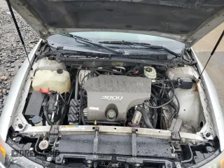 2001 Pontiac Bonneville SE z VIN 1G2HX54K314132594, wystawiony jako Copart lot #56895605 z przebiegiem 270 101 mil mil oraz Szkody całkowita. Historia ofert i sprzedaży dostępna na DreamBid. Obrazek 11.