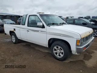 1997 Nissan Frontier XE with VIN 1N6SD16S8VC426940, listed as a Copart auction lot 55860235 with 242,265 mi miles and Salvage title. Bid and sale history available at DreamBid. Image 4.
