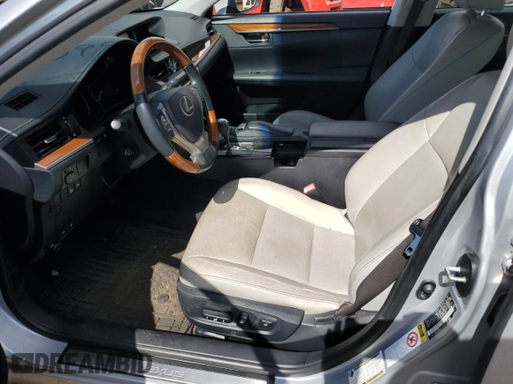 2013 Lexus ES 300h with VIN JTHBW1GG3D2004262, listed as a Copart auction lot 52290995 with 70,565 mi miles and Salvage title. Bid and sale history available at DreamBid. Image 7.
