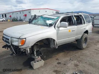 1998 Toyota 4Runner SR5 with VIN JT3HN86R0W0165939, listed as a IAAI auction lot 40318302 with 318,707 mi miles. Bid and sale history available at carsss.com. Image 2.