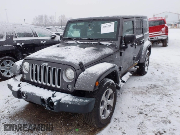 2017 Jeep Wrangler Unlimited Sahara with VIN 1C4BJWEG4HL591149, listed as a IAAI auction lot 41542157 with 70,630 mi miles. Bid and sale history available at carsss.com. Image 17.
