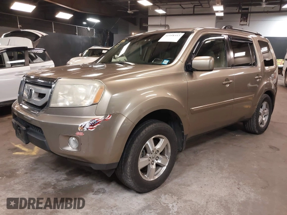 2009 Honda Pilot EX-L with VIN 5FNYF48639B011686, listed as a IAAI auction lot 41958353 with 155,382 mi miles and . Bid and sale history available at carsss.com. Image 17.