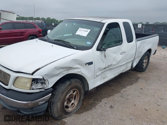 2001 Ford F-150 XL z VIN 1FTZX17281NB02781, wystawiony jako IAAI lot #42377688 z przebiegiem 180 830 mil mil oraz . Historia ofert i sprzedaży dostępna na DreamBid. Obrazek 6.