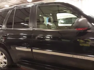 2004 GMC Envoy SLE with VIN 1GKDT13S542265104, listed as a IAAI auction lot 41884797 with 154,190 mi miles. Bid and sale history available at carsss.com. Image 14.
