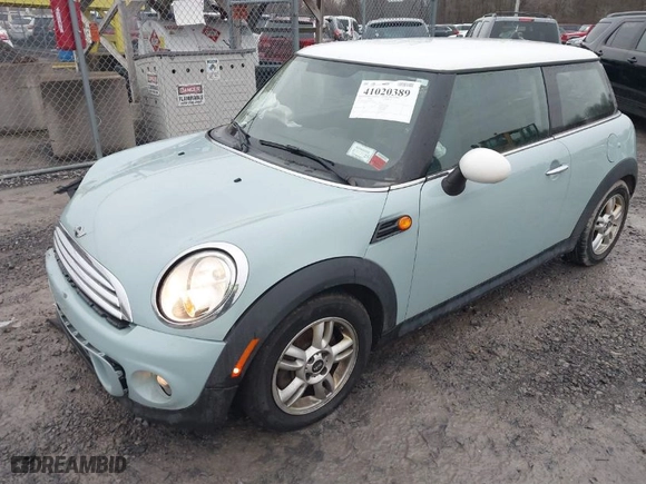 2013 MINI Cooper Hardtop with VIN WMWSU3C51DT686959, listed as a IAAI auction lot 41020389 with 86,770 mi miles. Bid and sale history available at carsss.com. Image 2.