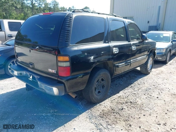 2004 GMC Yukon SLT with VIN 1GKEC13Z44J328264, listed as a IAAI auction lot 41993825 with 267,247 mi miles. Bid and sale history available at carsss.com. Image 4.