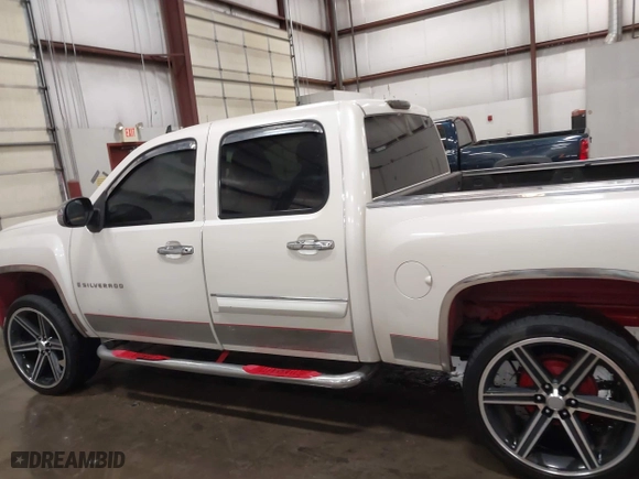 2009 Chevrolet Silverado 1500 LTZ with VIN 3GCEK33M39G177554, listed as a IAAI auction lot 41282566 with 142,356 mi miles. Bid and sale history available at carsss.com. Image 15.