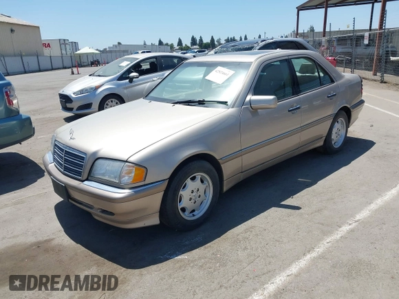 2000 Mercedes-Benz C 230/260/280/320 z VIN WDBHA29G1YA802945, wystawiony jako IAAI lot #42524661 z przebiegiem 161 227 mil mil oraz . Historia ofert i sprzedaży dostępna na DreamBid. Obrazek 2.