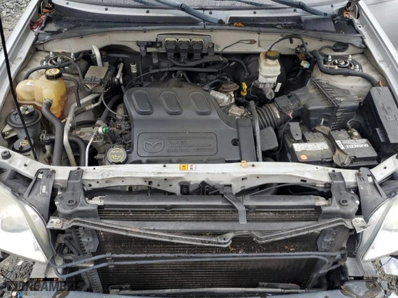 2005 Mazda Tribute LX with VIN 4F2YZ94185KM47932, listed as a Copart auction lot 63587744 with 203,178 mi miles and Salvage Title. Bid and sale history available at carsss.com. Image 12.