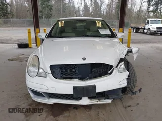 2006 Mercedes-Benz R 3.5L with VIN 4JGCB65E66A028785, listed as a IAAI auction lot 41880524 with 158,442 mi miles and . Bid and sale history available at DreamBid. Image 6.
