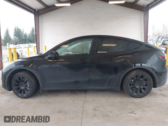 2023 Tesla Model Y Long Range with VIN 7SAYGAEEXPF707503, listed as a IAAI auction lot 41712166 with 27,467 mi miles and . Bid and sale history available at carsss.com. Image 14.