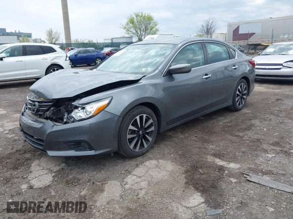 2018 Nissan Altima SR with VIN 1N4AL3AP0JC191207, listed as a IAAI auction lot 42033493 with 104,822 mi miles and . Bid and sale history available at carsss.com. Image 16.