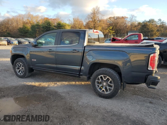 2020 GMC Canyon 4WD All Terrain w/Cloth with VIN 1GTG6FEN0L1173679, listed as a Copart auction lot 79684354 with 58,901 mi miles and Salvage Title. Bid and sale history available at carsss.com. Image 2.